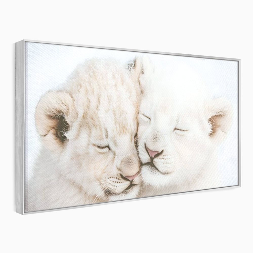 Tablou canvas cu doi pui de leu dormind imbratisati, in rama de aluminiu argintiu